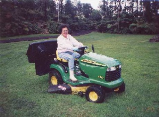 Mary tries the John Deere at our house
